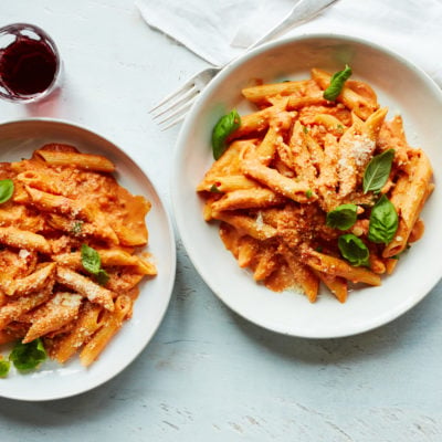 Two plates of penne alla vodka.