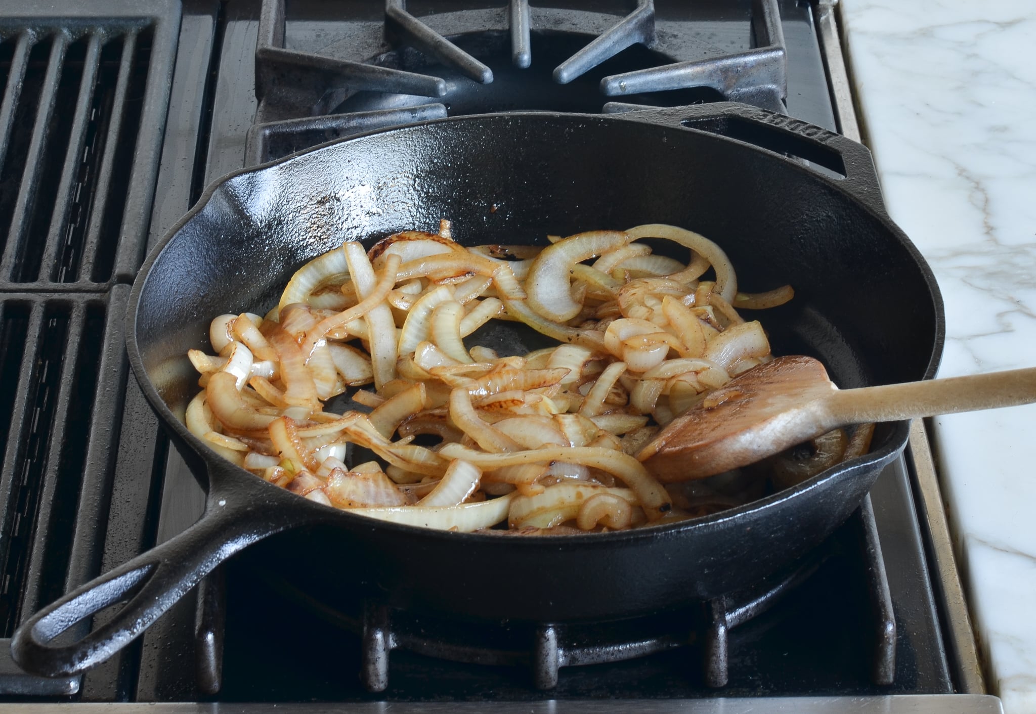 Browned onions in a skillet.