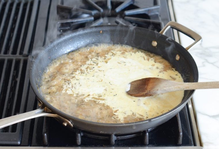 adding cream to reduced liquid in skillet