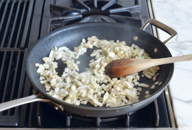 onions, thyme and salt in skillet