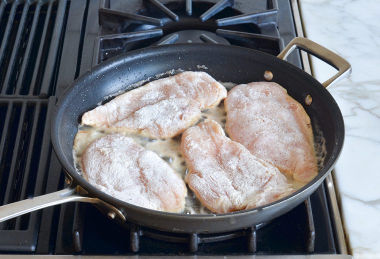 browning chicken on first side