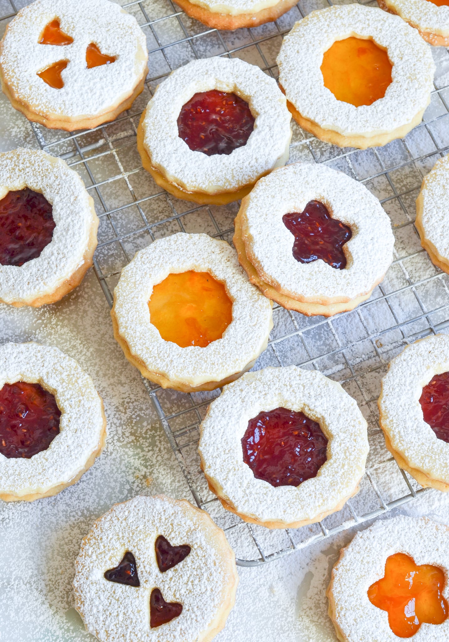 linzer cookies on wire rack.
