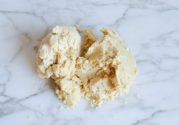 crumbly dough on counter