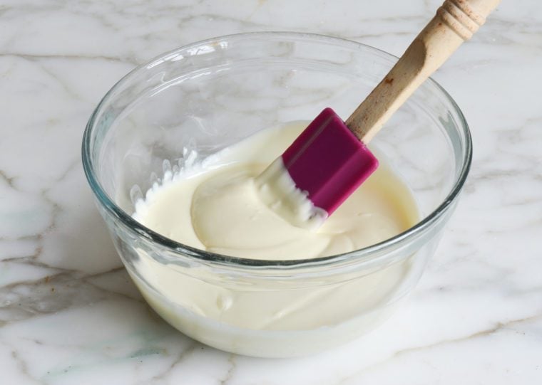 melted white chocolate chips in bowl