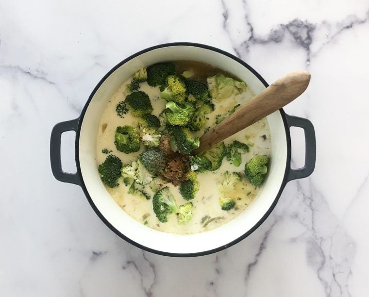 adding broccoli florets and cream