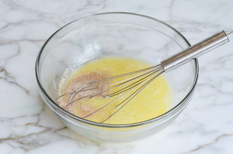 butter, water, sugar, yeast and salt in bowl