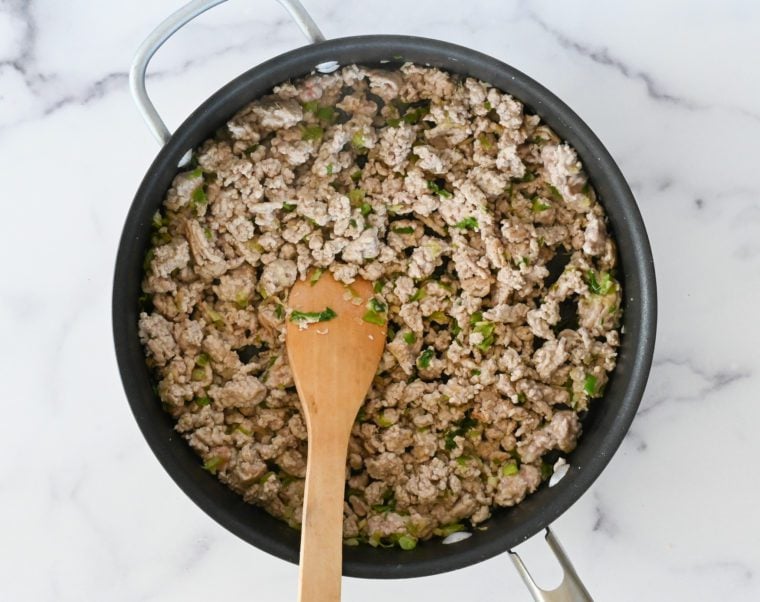 browned pork in skillet