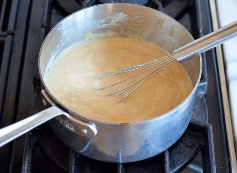bubbling sauce in pot.