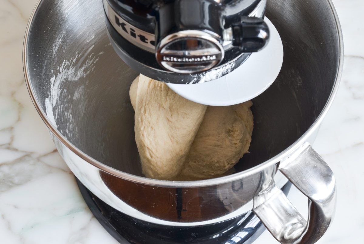 kneading the pretzel dough.