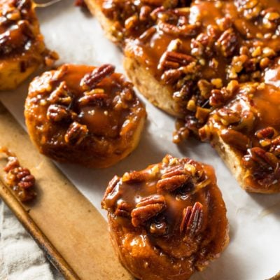 Sticky buns on parchment paper.