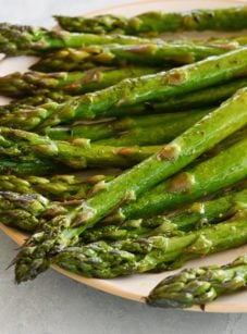 Roasted asparagus on a plate.