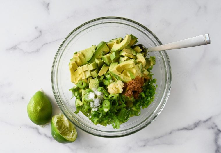 guacamole ingredients in mixing bowl