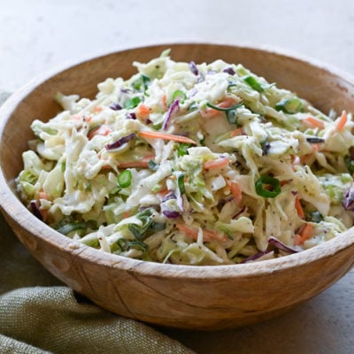 Classic coleslaw in a wooden bowl.