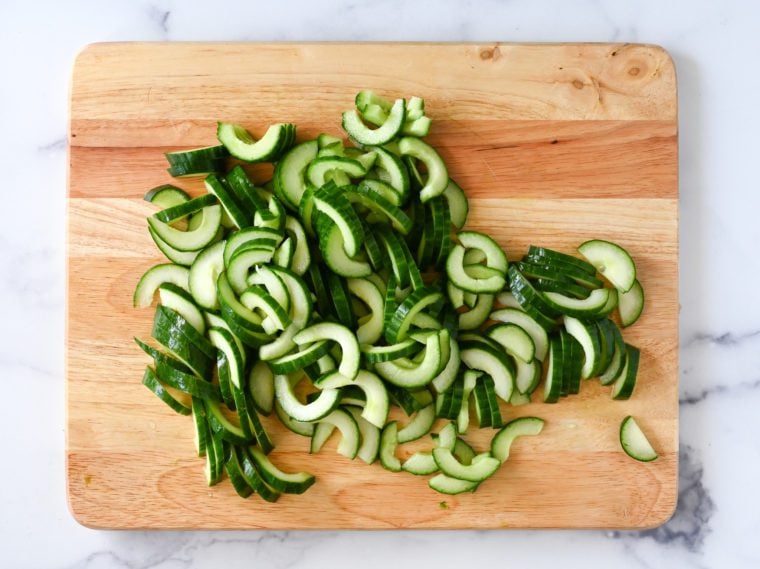 Cucumbers sliced into half-moons.
