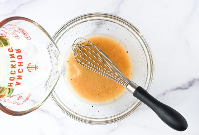 slowly whisking in the oil