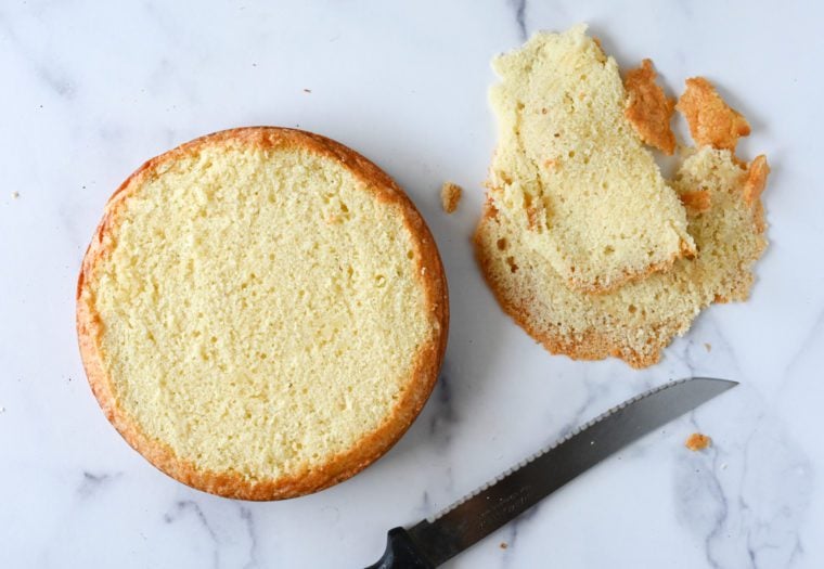 trimming domed top off of cake