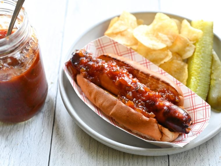 Hot dog topped with spicy relish.