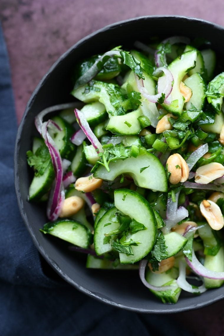 Thai cucumber salad with peanuts in a bowl.