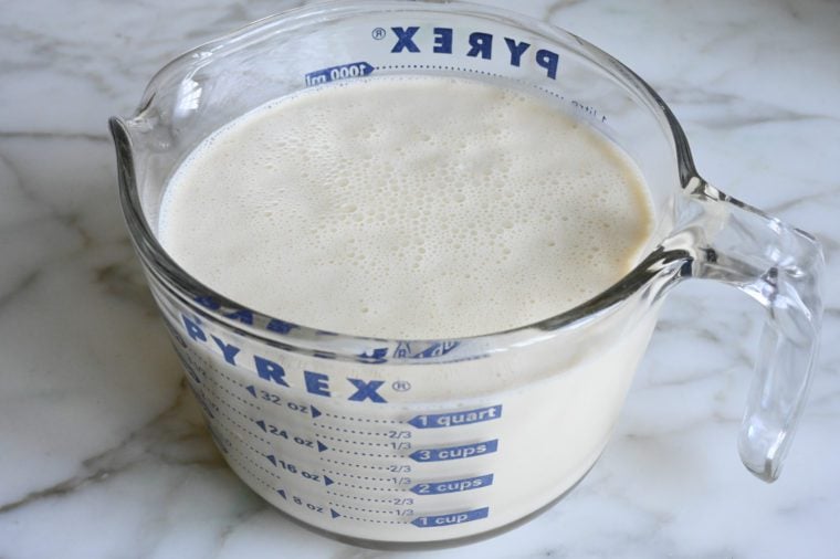 crepe batter in large measuring cup.