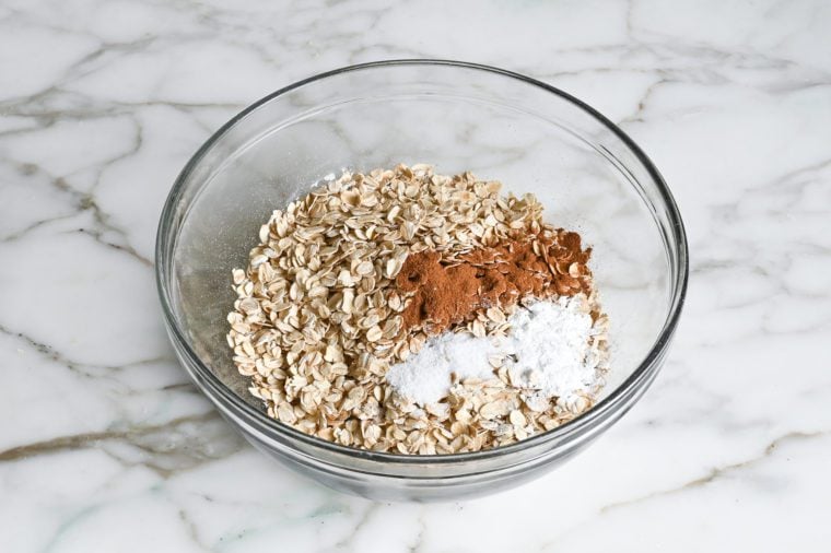 oats, cinnamon, baking powder and salt in bowl