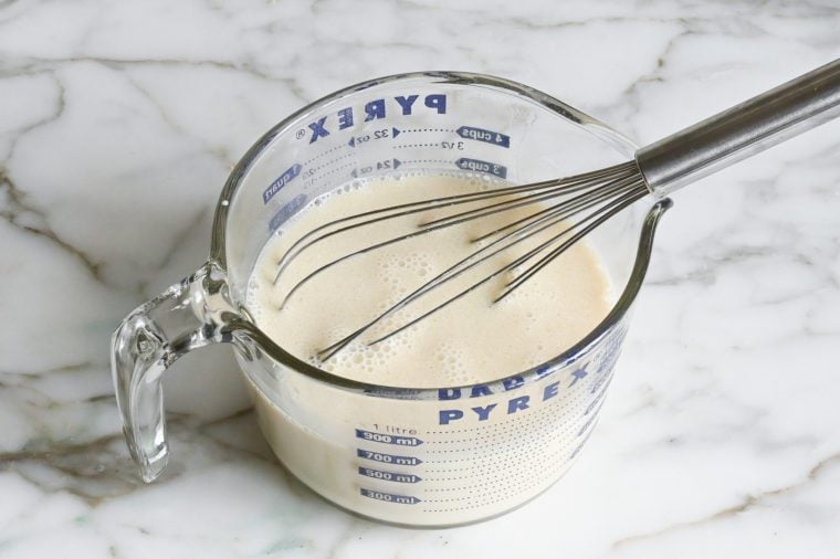liquid ingredients whisked together in measuring cup