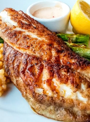 blackened tilapia on plate