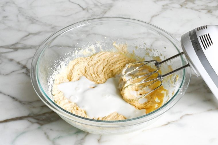 adding the buttermilk to the batter