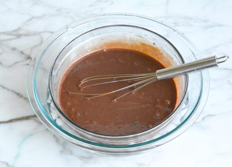 cooling chocolate ice cream mixture in ice bath