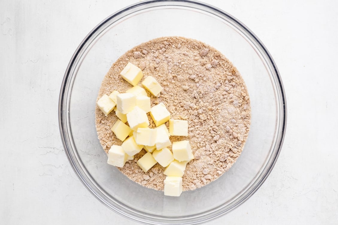 Flour mixture with cubes of butter added