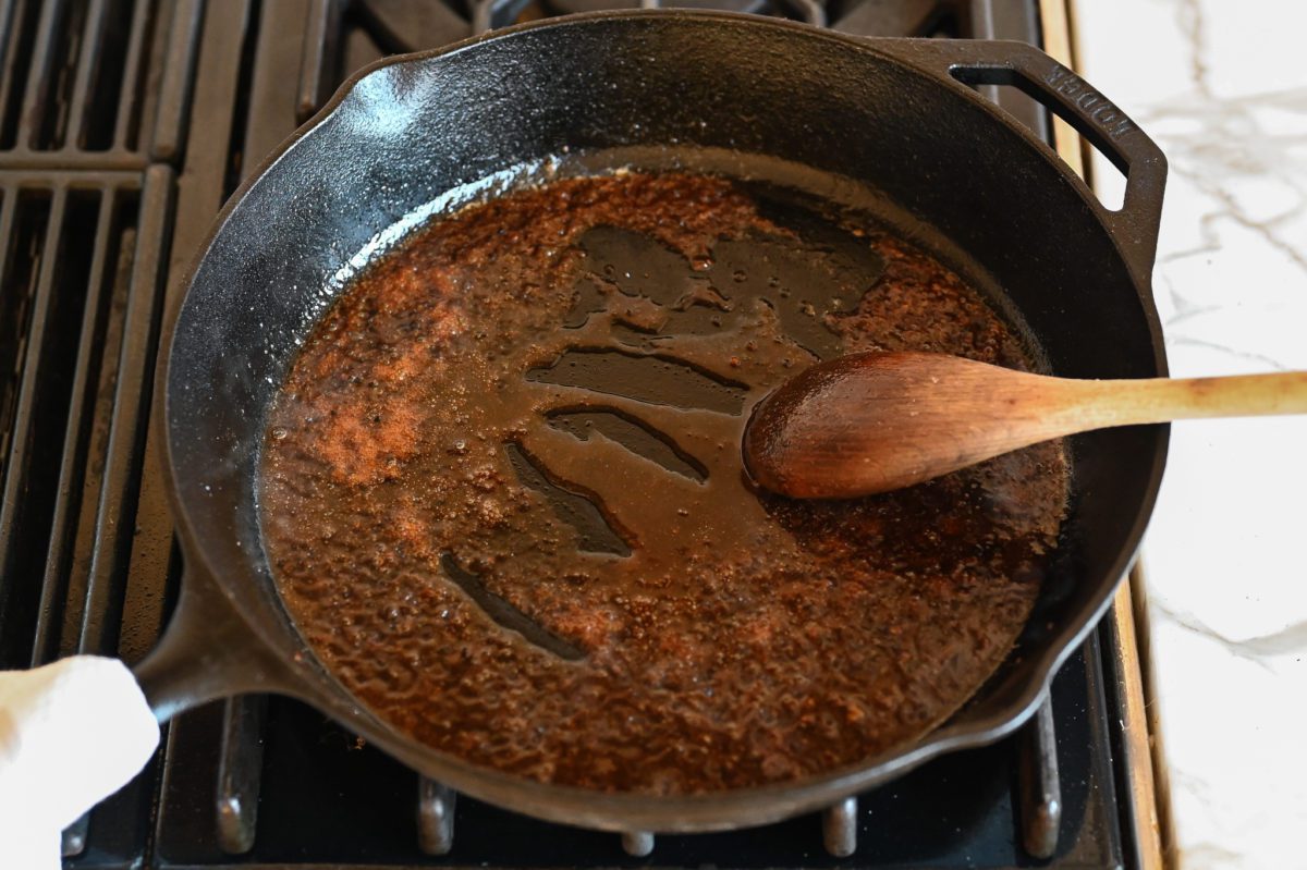 scraping the brown bits from the roasting pan