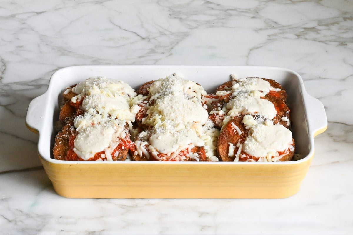 assembled eggplant parmesan ready to bake
