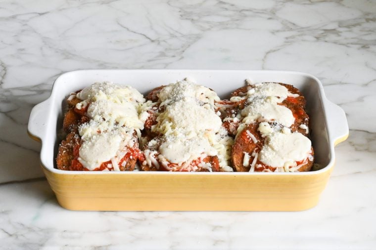 assembled eggplant parmesan ready to bake