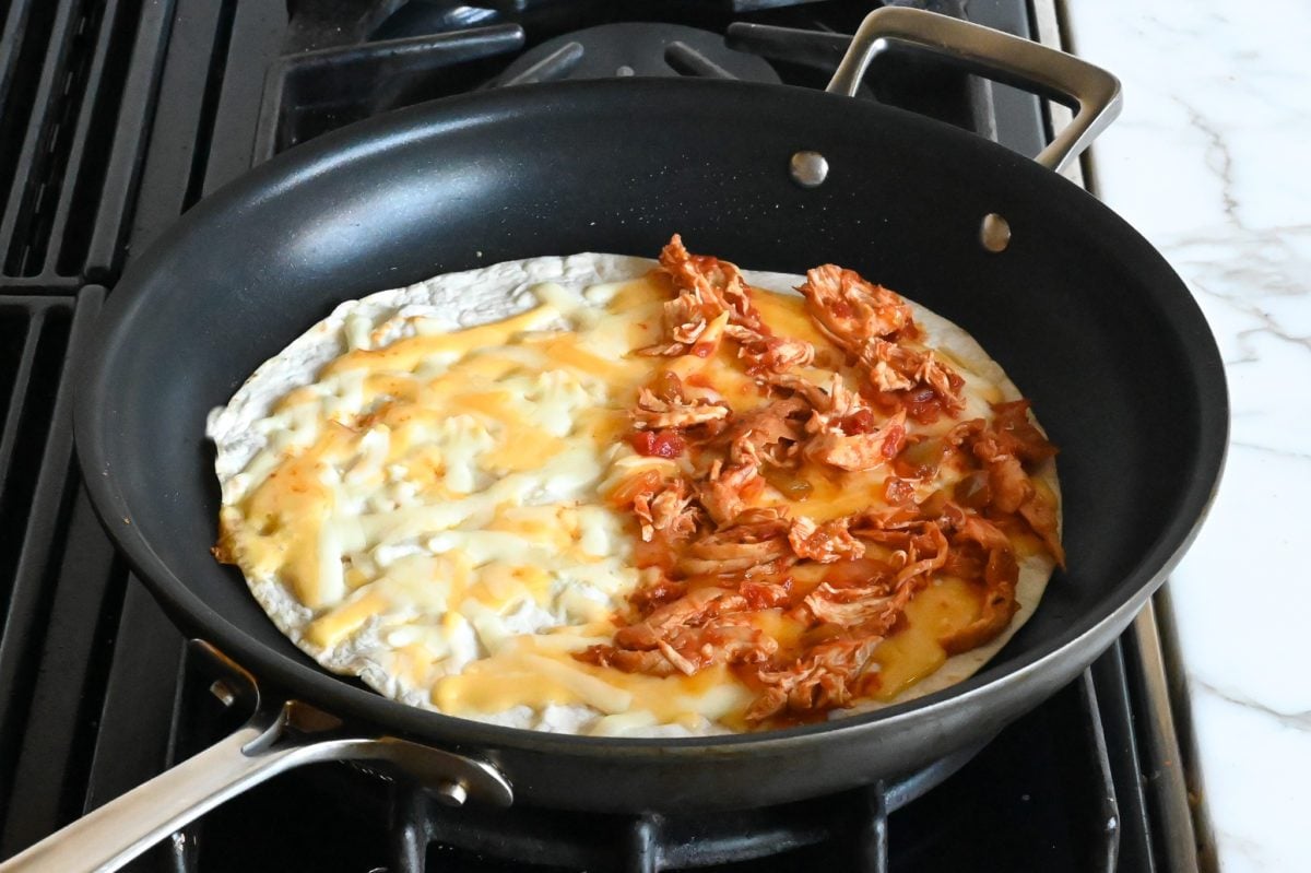 chicken mixture spread over half of the tortilla