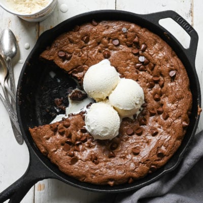 Double chocolate skillet cookie missing a slice.