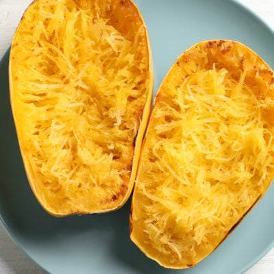 Halved and shredded spaghetti squash.