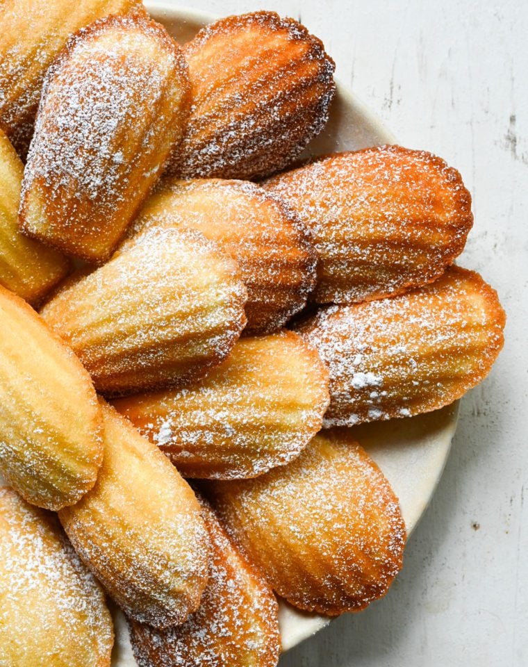 Madeleines on a plate.