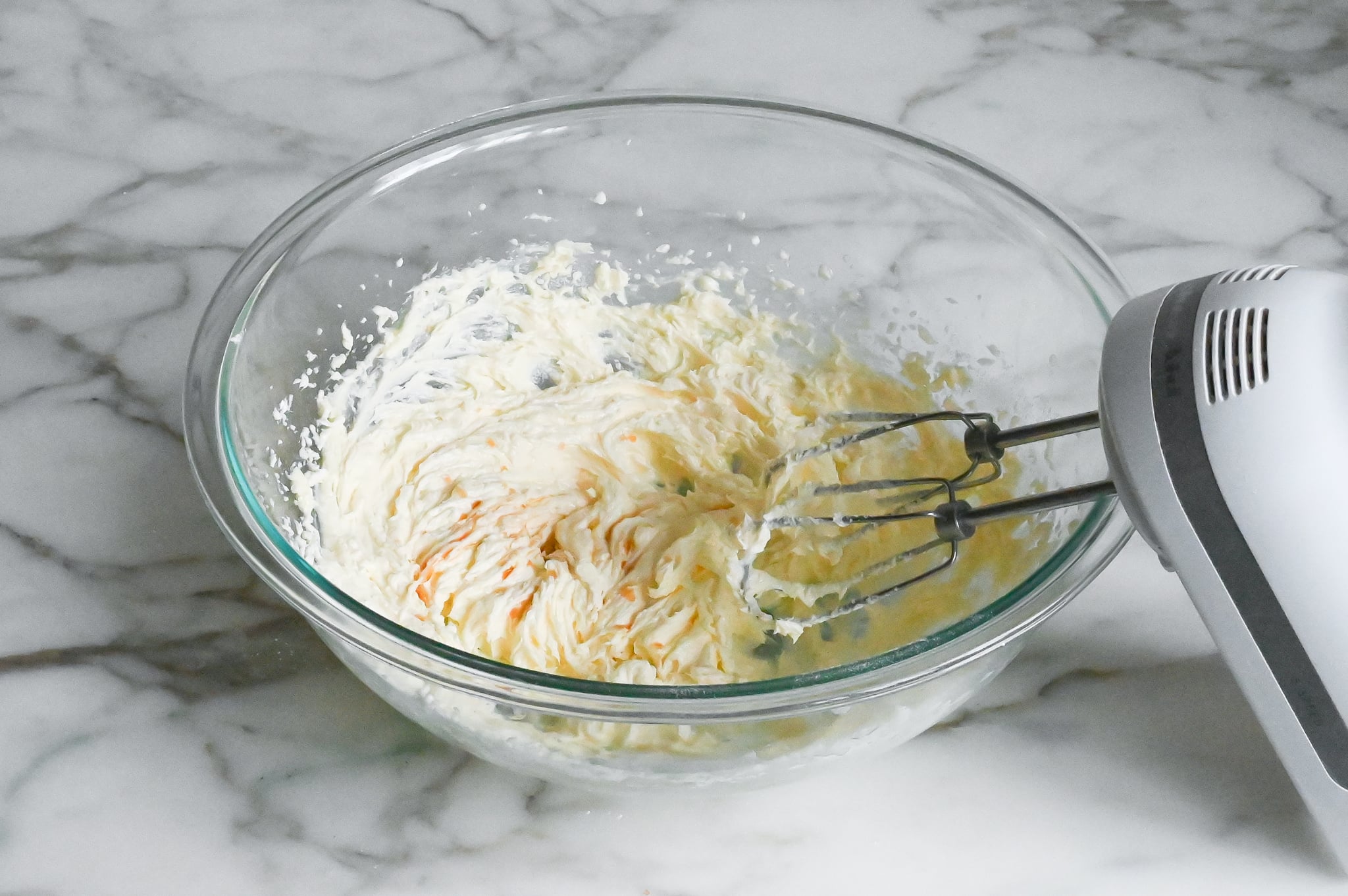 beaten butter and sugar with vanilla and almond extract