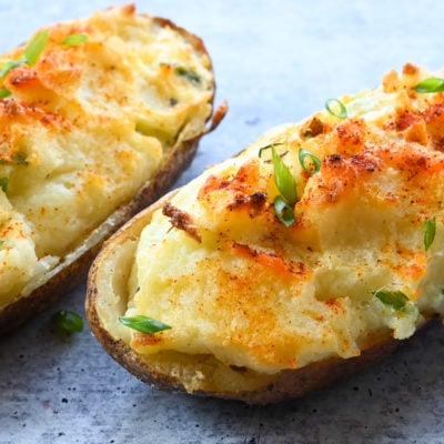 Twice baked potatoes on parchment paper.