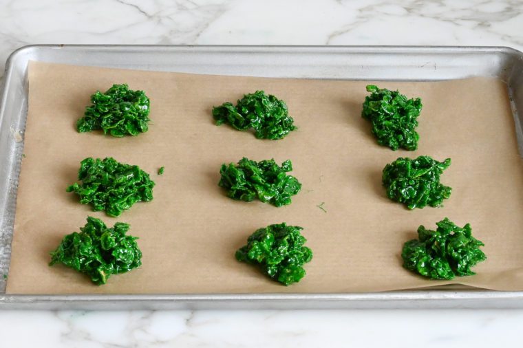mounds of Christmas wreath mixture on baking sheet