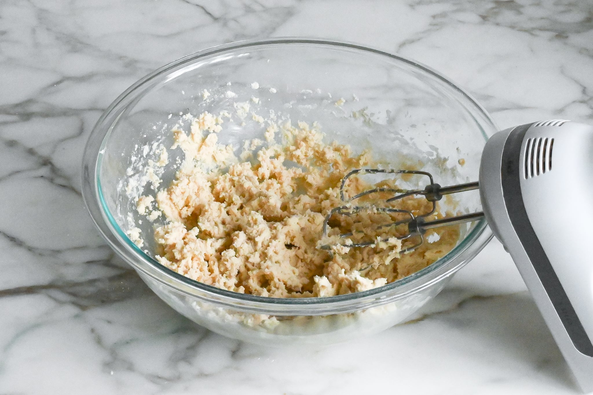 Snowball cookie dough in a bowl.