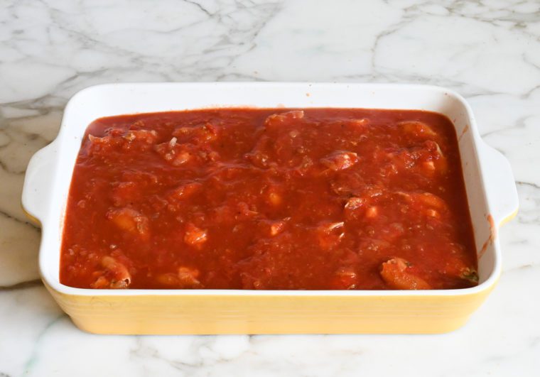 stuffed shells covered with tomato sauce