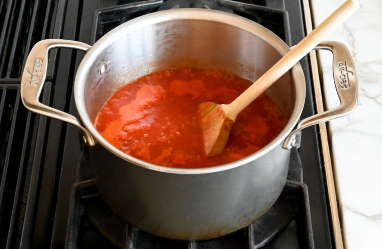 simmering tomato sauce