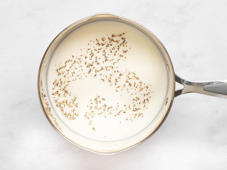 seasoned milk and water in pot.