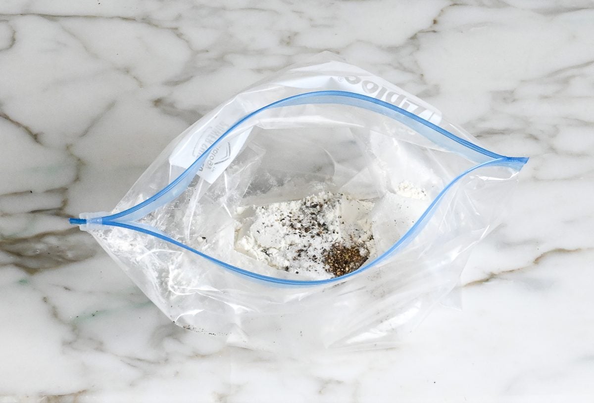 flour, salt, and pepper in ziplock bag