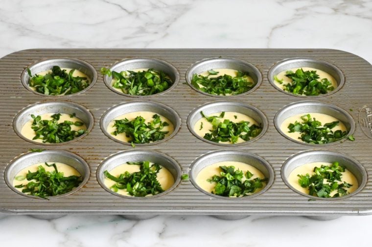 spinach and scallions on egg bite batter