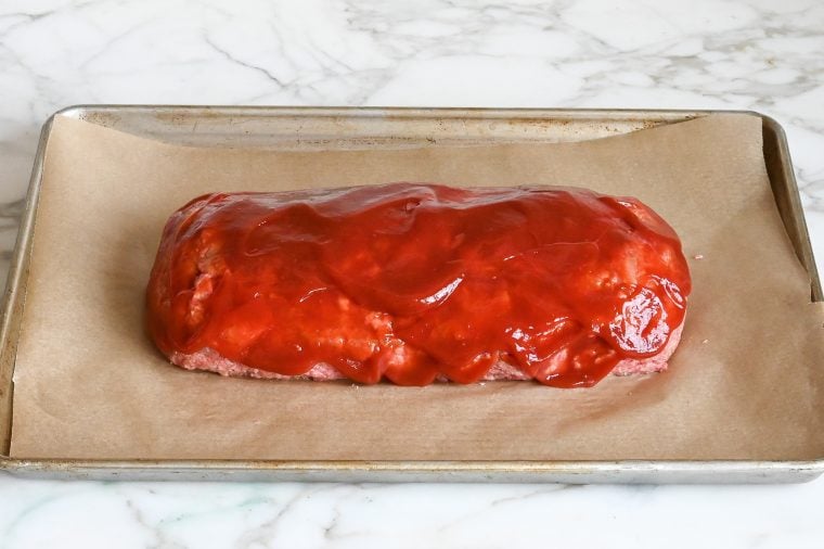 ketchup glaze spooned over meatloaf