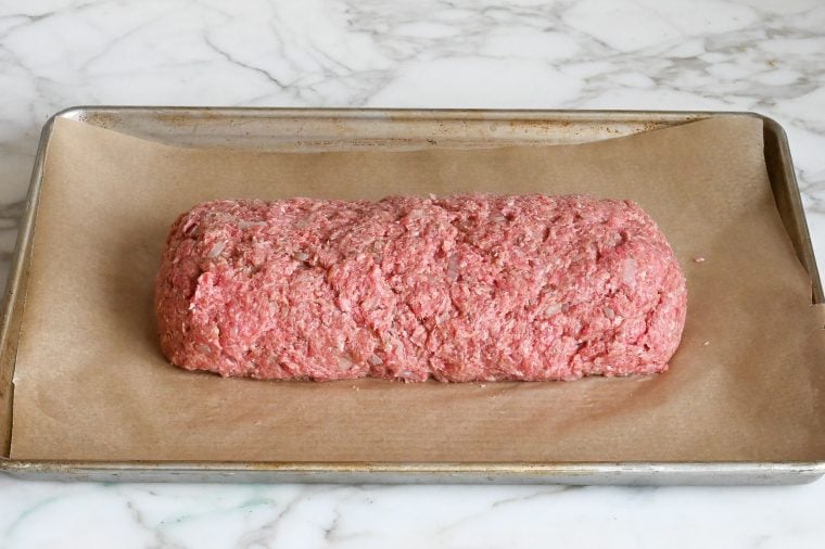 family-style meatloaf formed on baking sheet