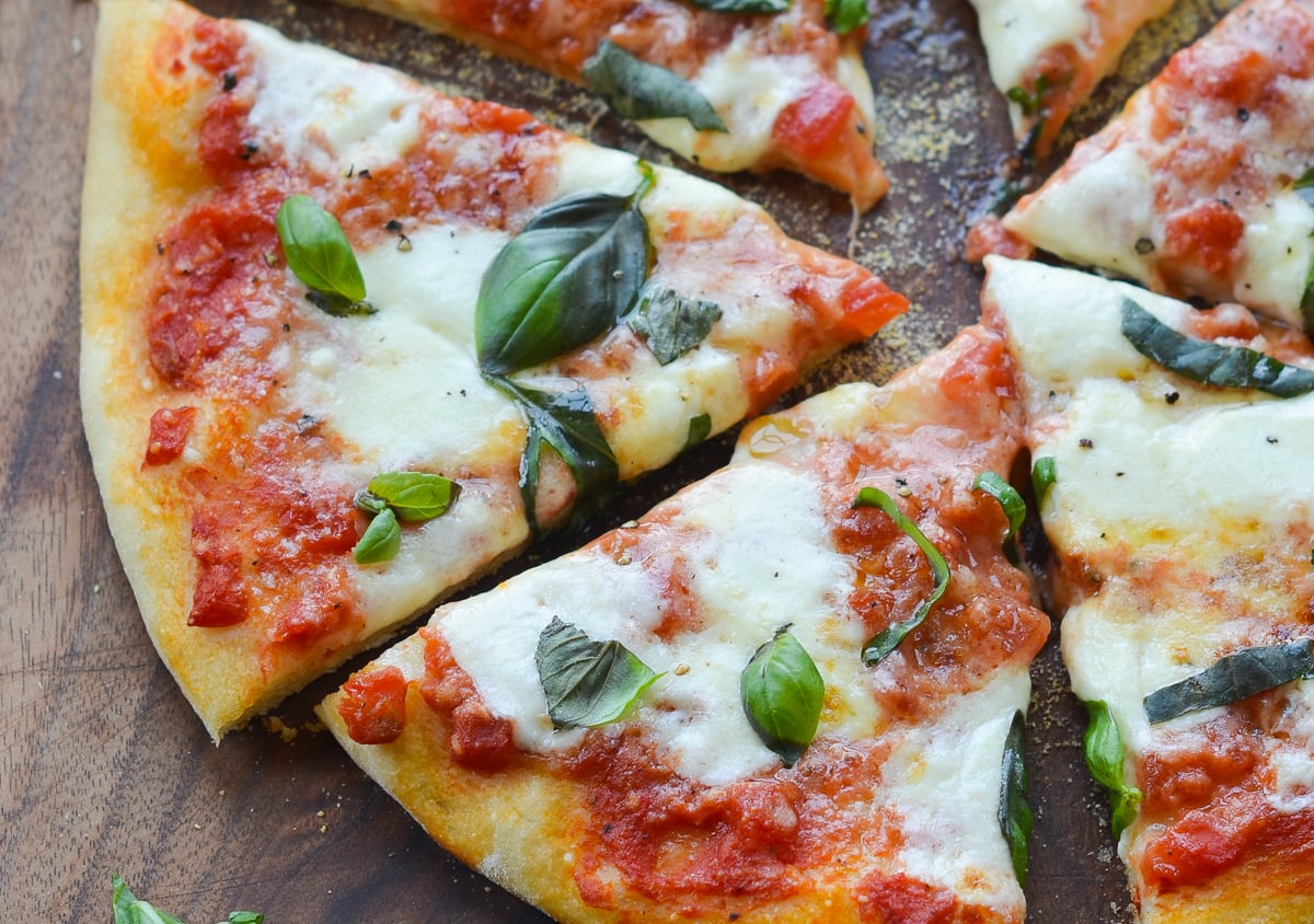 Margherita pizza on cutting board