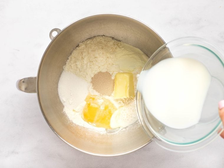 Adding the warm milk and water mixture