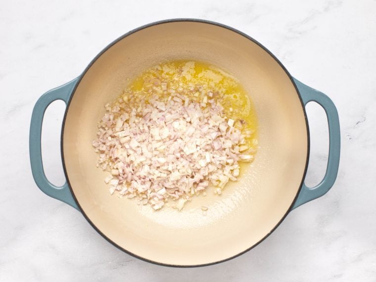shallots and butter in pot